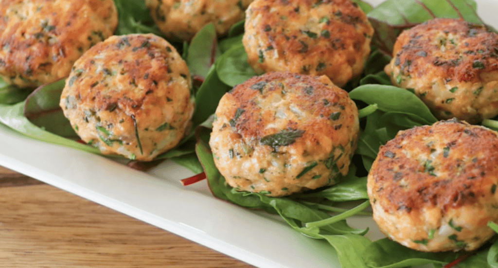 Easy Salmon Cakes on a plate with garnishes