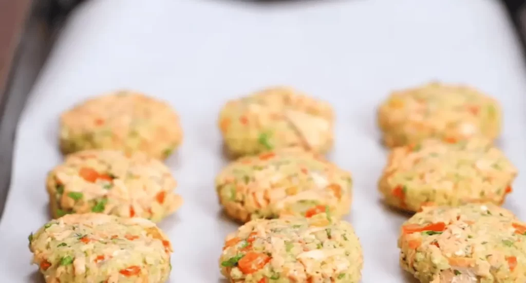 Salmon patties cooked to perfection, demonstrating tips to keep them from falling apart.