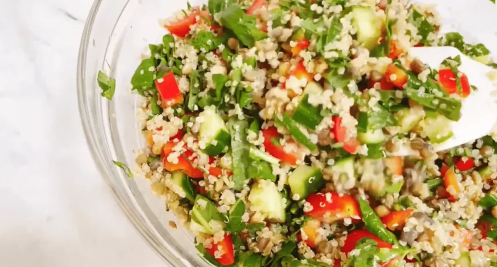 Colorful bowl of Costco Quinoa Salad with vegetables and grains.