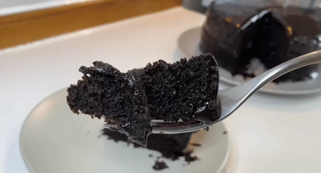 Slices of Matilda Chocolate Cake arranged on a dessert table