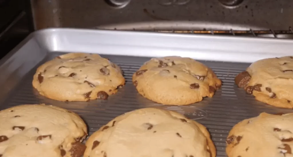 Nestle Chocolate Chips being added to cookie dough